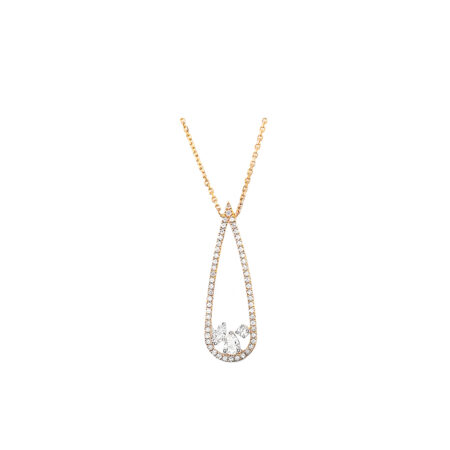 18kt yellow gold pear shaped necklace with diamonds inside